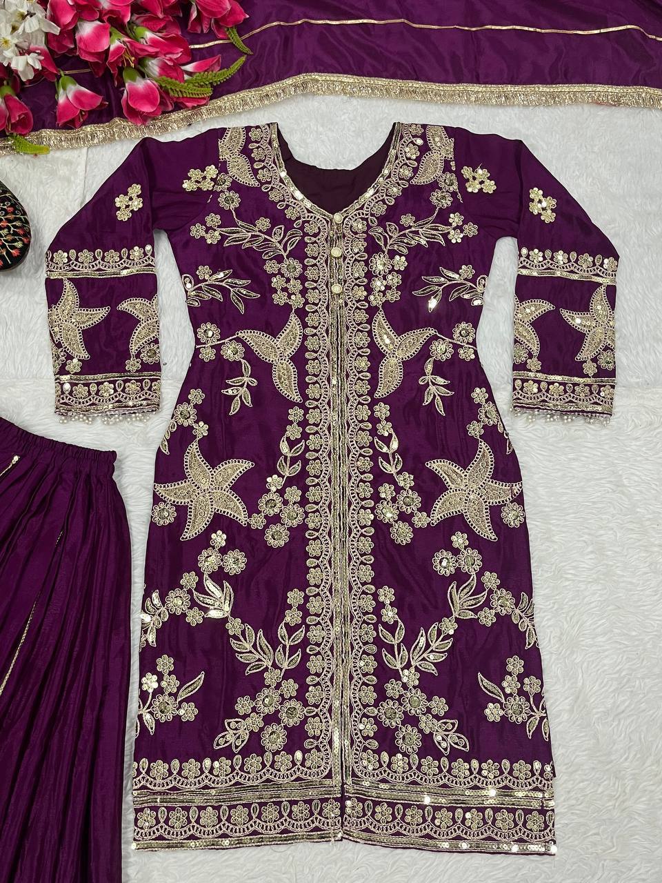 Regal Wine Purple Kurti and Flared Palazzo Suit Set Embellished with Intricate Floral Zari and Mirror Work